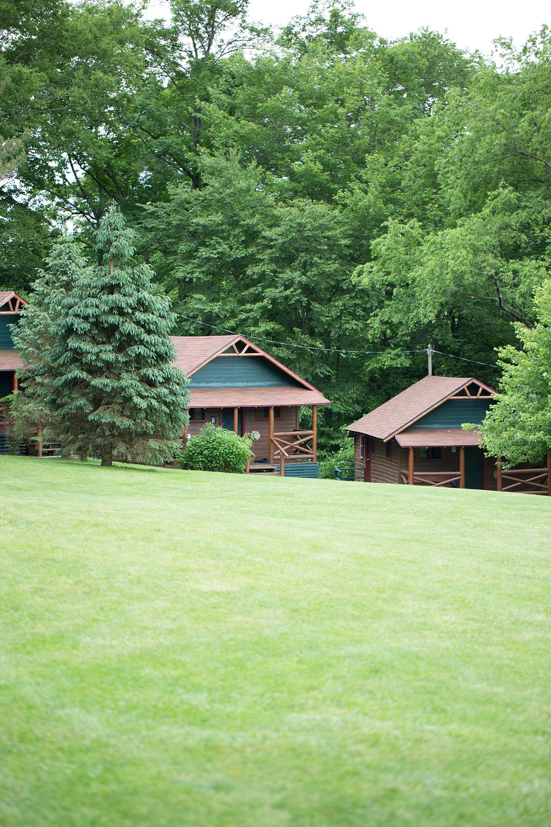 A Club Getaway summer camp weekend in Kent, CT about 90 minutes from NYC photographed by Mikkel Paige Photography. Guests stayed in cabins like campers!