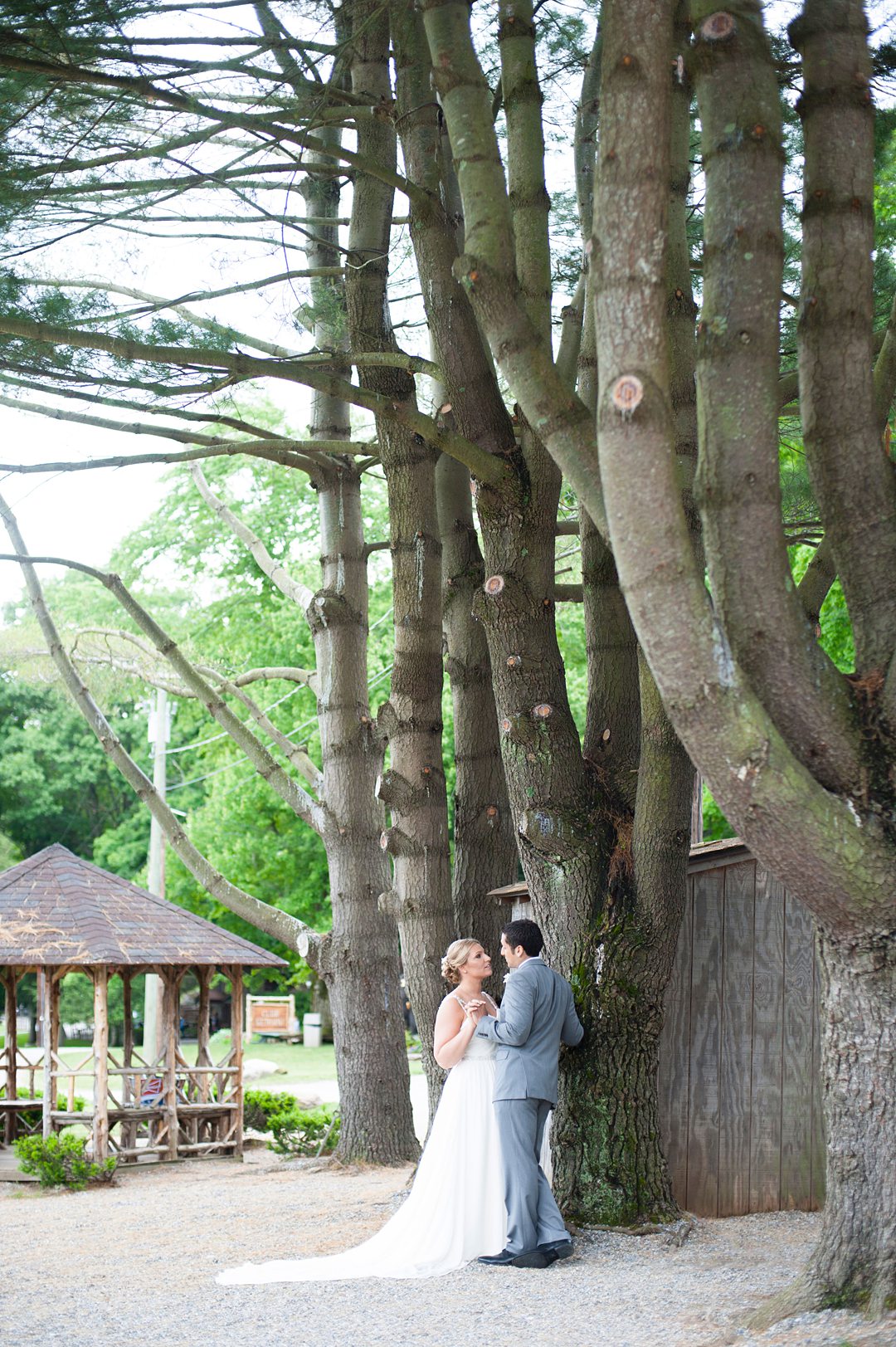 A Club Getaway summer camp weekend in Kent, CT about 90 minutes from NYC photographed by Mikkel Paige Photography. The bride and groom shared a moment after their first look.