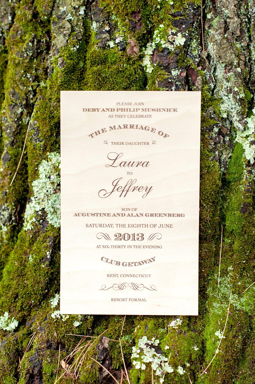 A couple had a summer camp wedding at Club Getaway and used wood for their invitations. Photographed by Mikkel Paige Photography. 