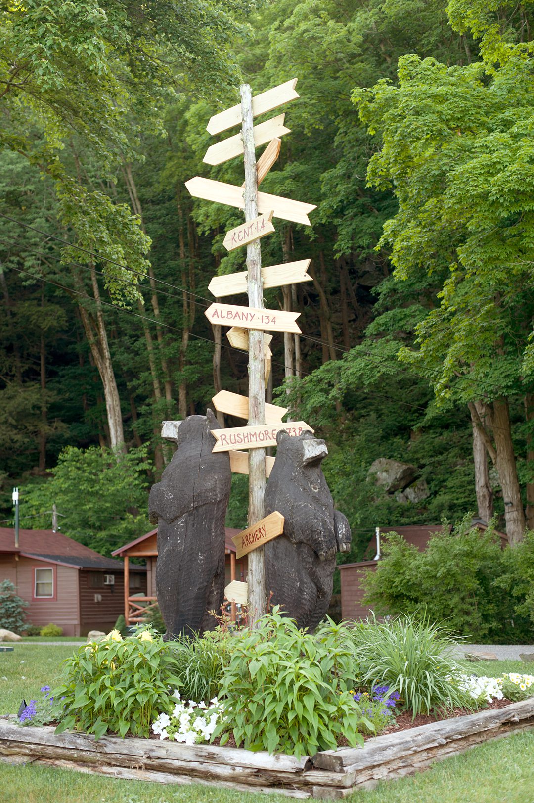 There was cute camp signage all over Club Getaway in Kent, CT for a summer camp wedding. This destination is 90 minutes from NYC. Photographed by Mikkel Paige Photography.