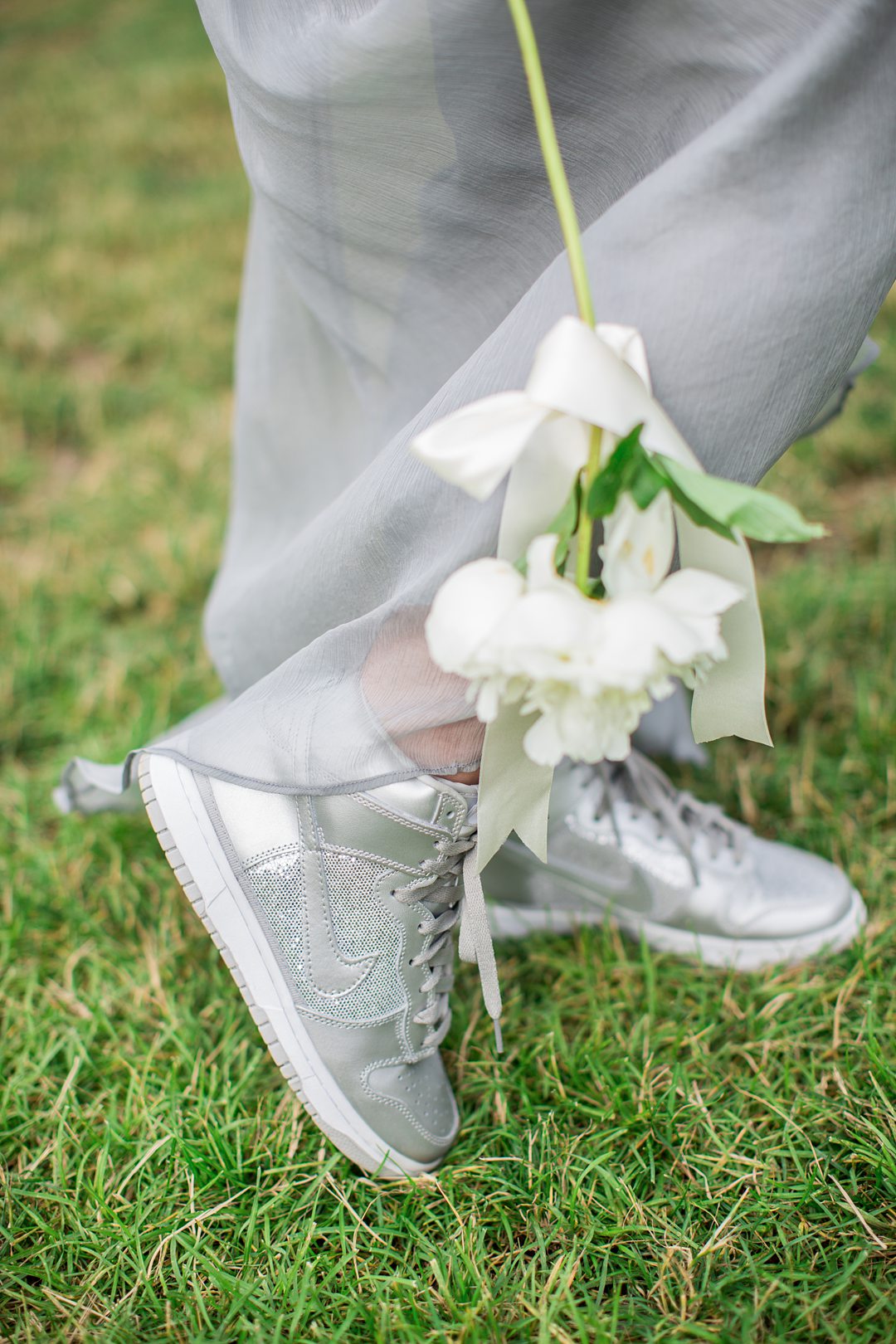 The Maid of Honor wore a grey chiffon dress and silver high top sneakers to her sister's wedding at Club Getaway. This camp venue is 90 minutes from NYC. Photos by Mikkel Paige Photography.