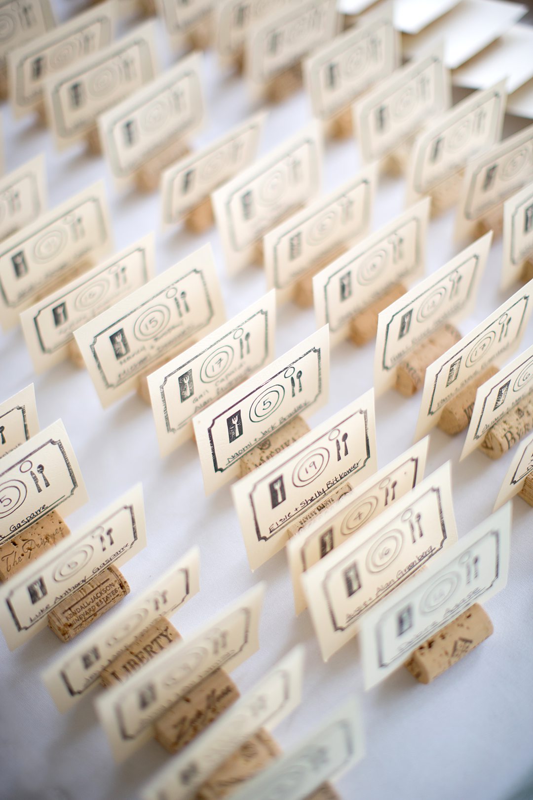 Escort cards at a wedding at Club Getaway. Photos by Mikkel Paige Photography.