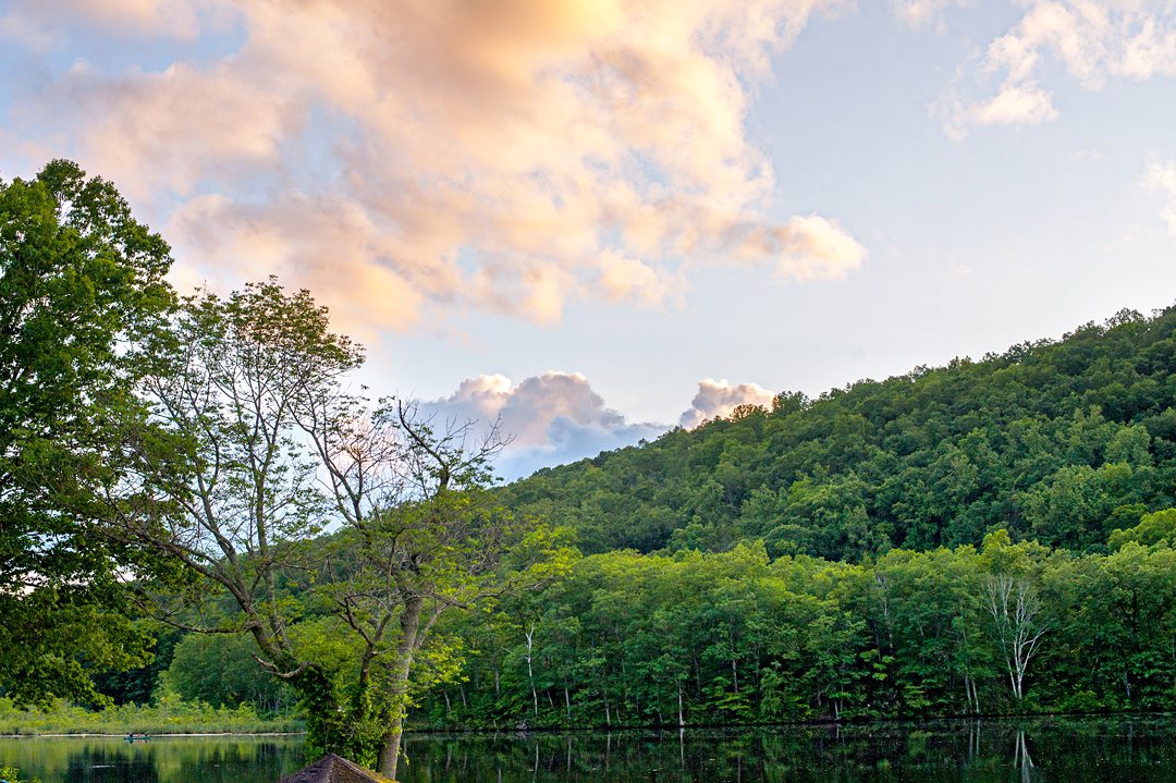 Sunset at Club Getaway for a summer camp wedding photographed by Mikkel Paige Photography.