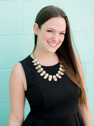 Photo of Mikkel Paige Photography, lead photographer and owner in NYC and Raleigh primarily for weddings, proposals and engagements.