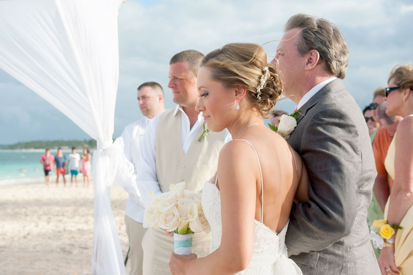 Caribbean Destination Wedding in Punta Cana, Dominican Republic at Larimar Resort. Photos by Mikkel Paige Photography. Wedding ceremony on the beach.