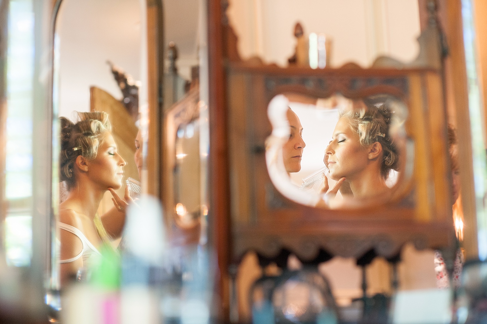 Bride prepares for her wedding day. Photos by Mikkel Paige Photography.