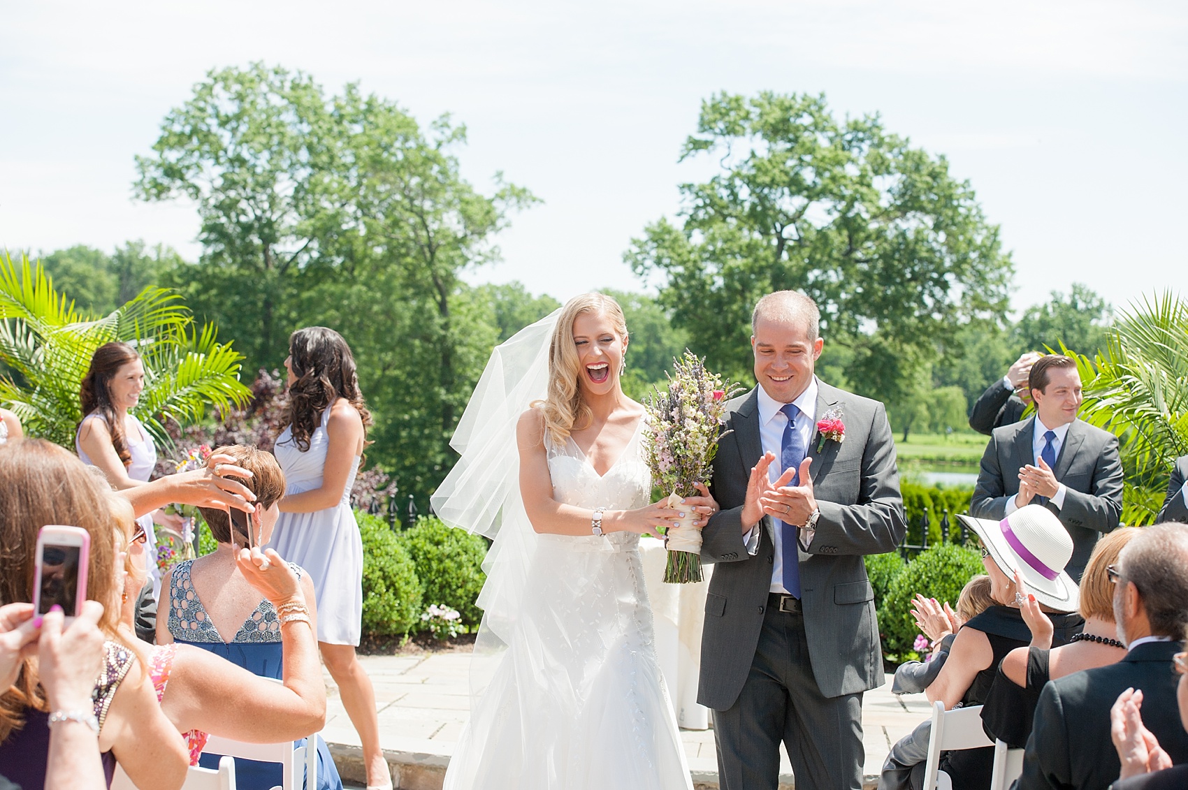 Outdoor summer wedding ceremony at The Park Savoy in New Jersey. Photo by Mikkel Paige Photography.