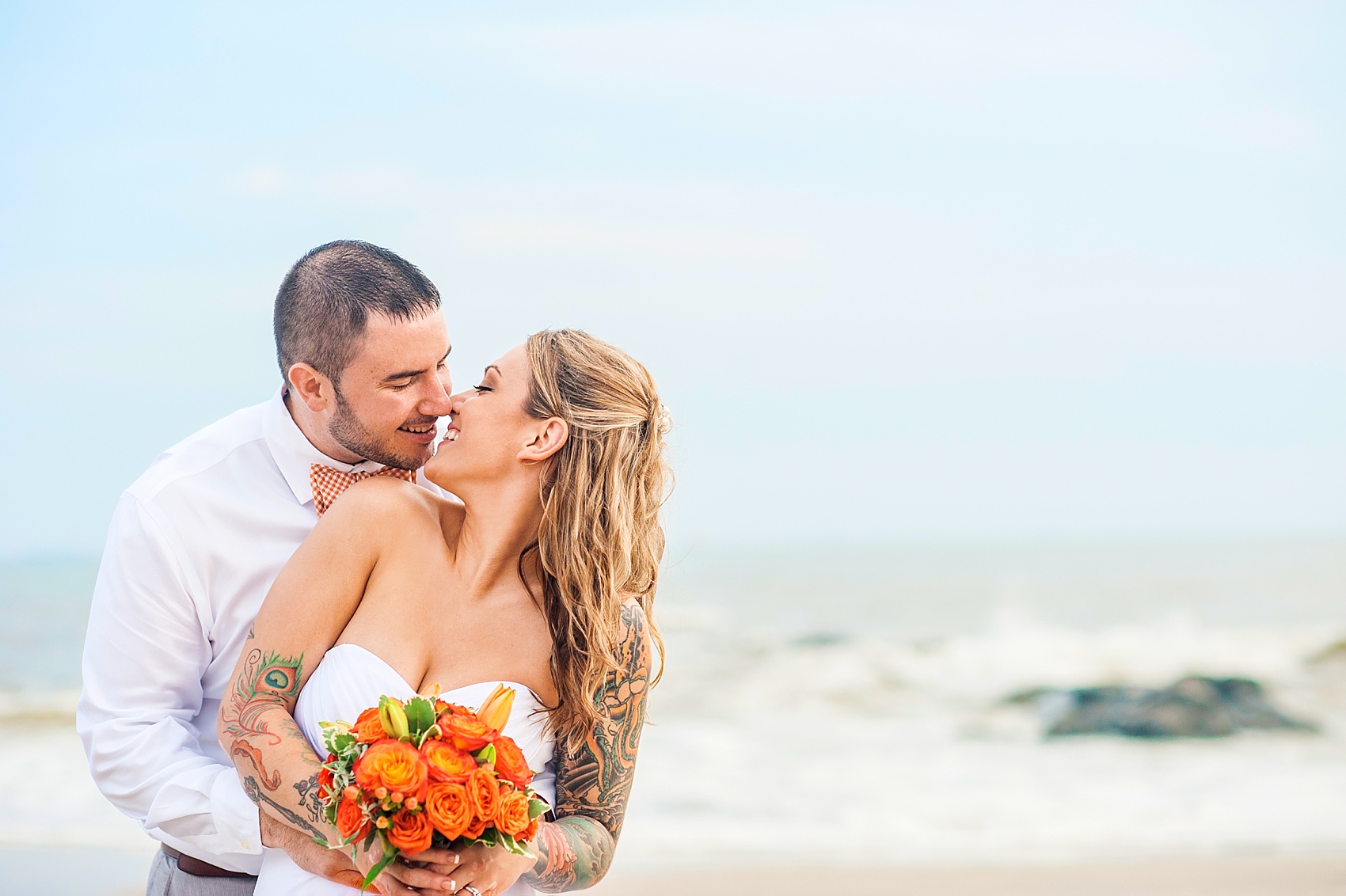 Beach wedding on Long Island shore, New York. Photos by Mikkel Paige Photography.