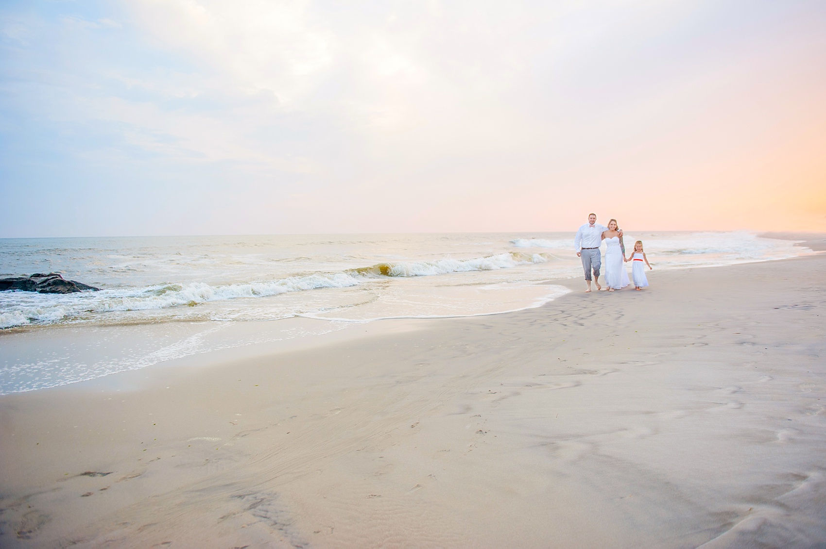 Beach wedding on Long Island shore, New York. Photos by Mikkel Paige Photography.