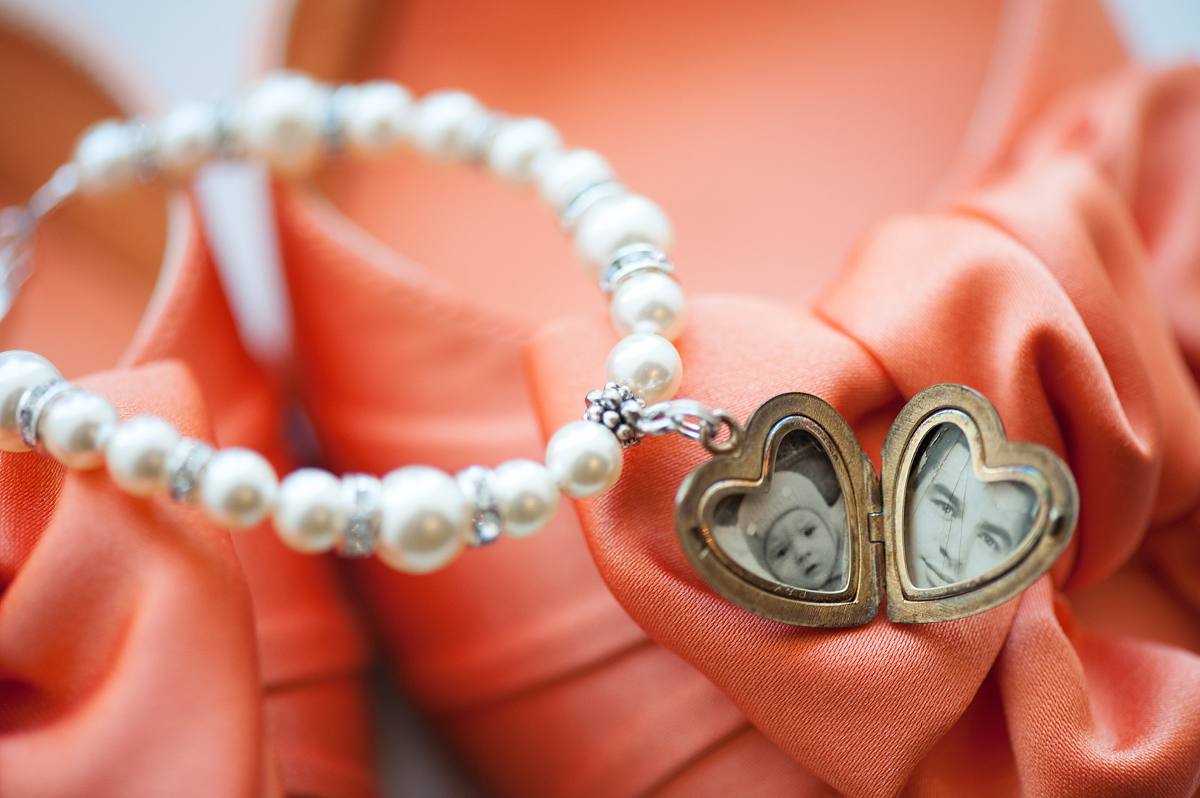 Special locket the bride wore for her wedding day, on a bracelet created by her mother. Photo by Mikkel Paige Photography for a downtown Baltimore wedding.