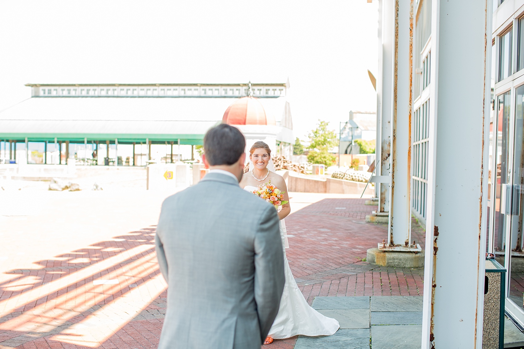 Bride and groom's first look at Baltimore, Maryland Museum of Industry. Photos by Mikkel Paige Photography.