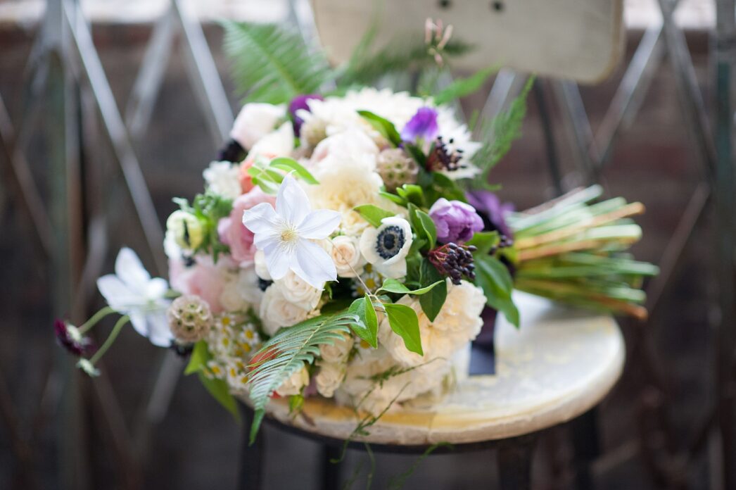 Bright summery wildflower bouquet by Sachi Rose Design florist. Photos by Mikkel Paige Photography.