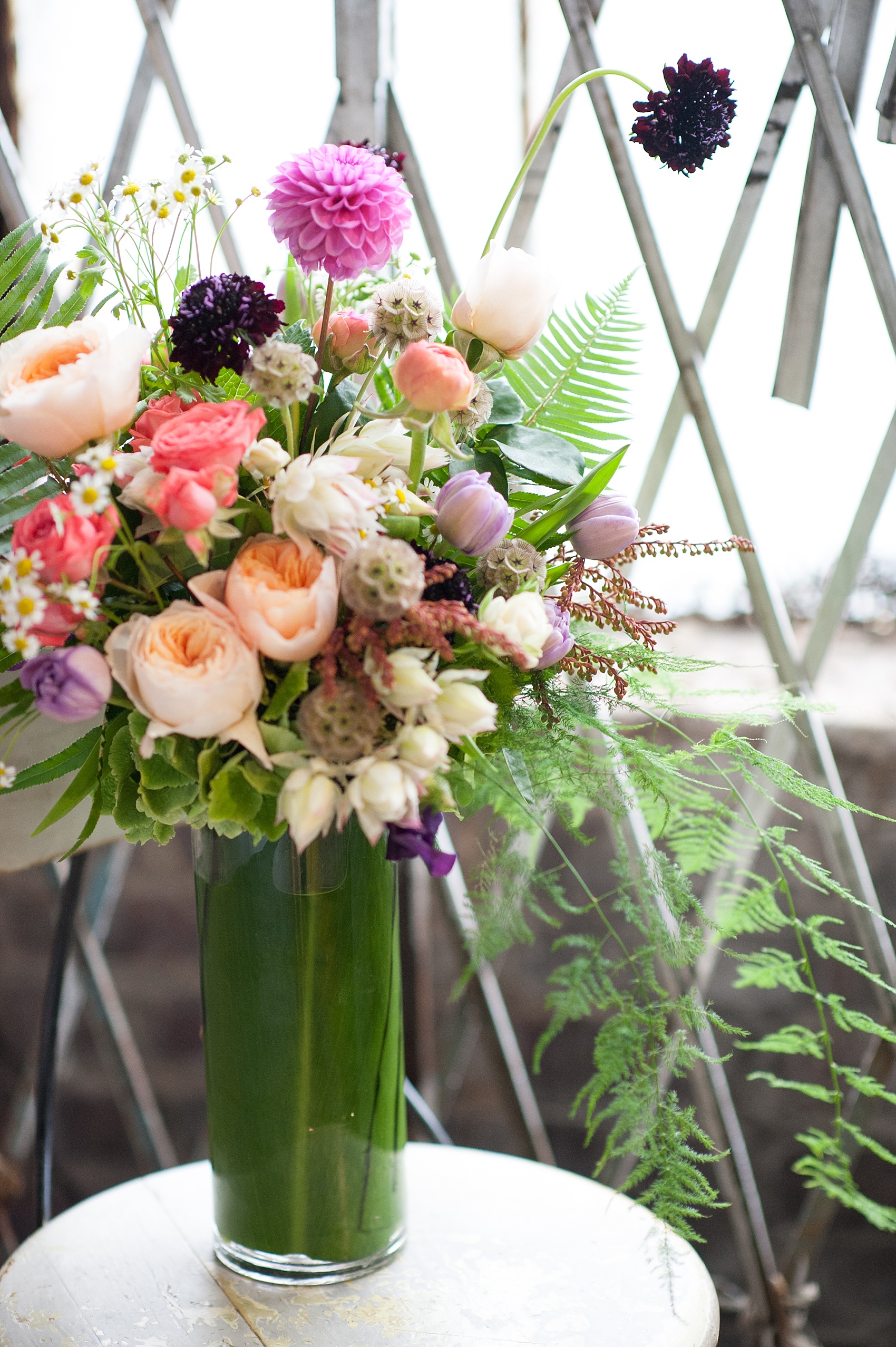 Bright summery wildflower bouquet by Sachi Rose Design florist. Photos by Mikkel Paige Photography.