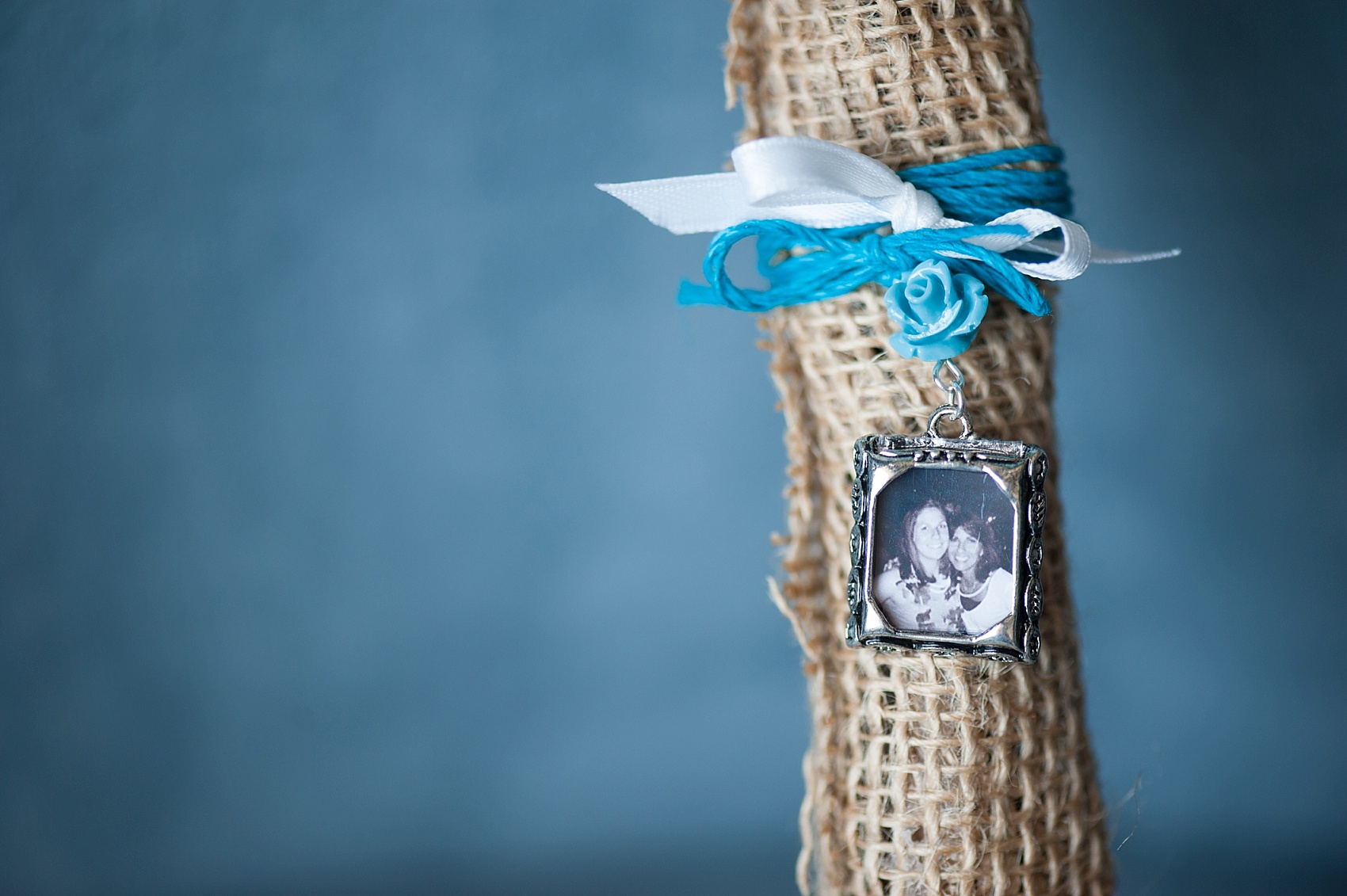 Locket with a photo of the bride's mother on her bouquet. Photos by Mikkel Paige Photography for a Hollow Brook Golf Club wedding.