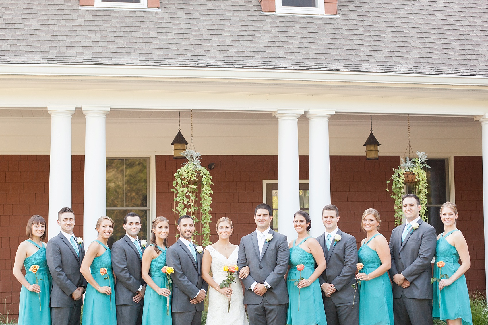 Wedding party in teal dresses and grey suits for a Hollow Brook Golf Club wedding in New York. Photos by Mikkel Paige Photography.
