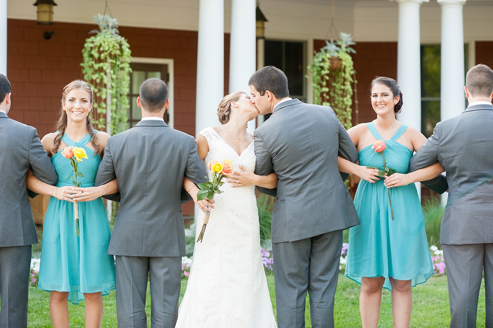 Wedding party in teal dresses and grey suits for a Hollow Brook Golf Club wedding in New York. Photos by Mikkel Paige Photography.