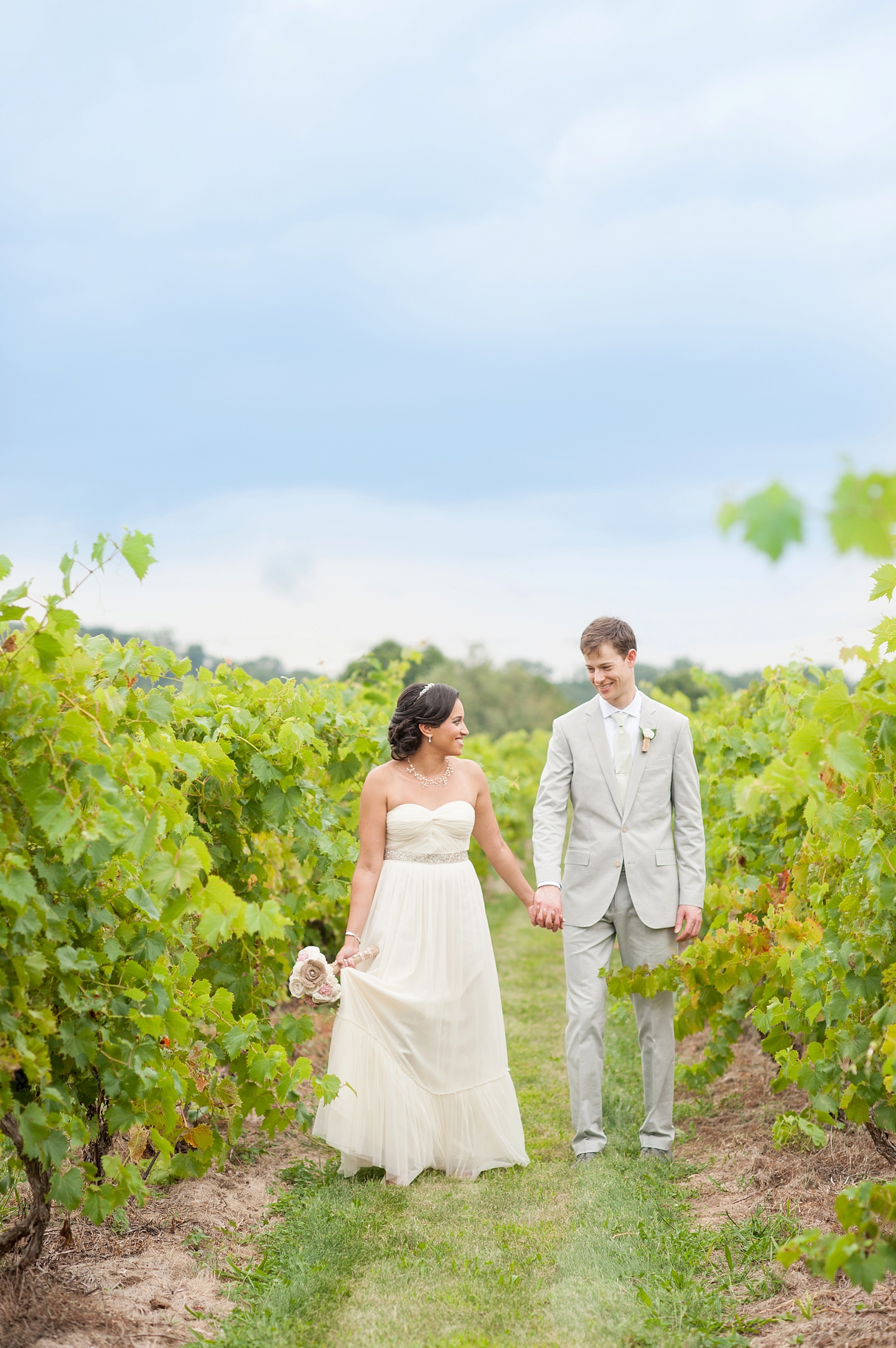 Bride in BHLDN, A Va Et Vien, and groom in J. Crew for a summer vineyard wedding at Hopewell Valley Vineyards. Photos by New Jersey wedding photographer, Mikkel Paige Photography.