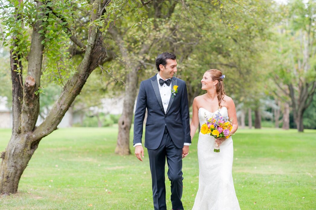 Perona Farms wedding photos bride and groom apple orchard for their colorful summer celebration. Pictures by New Jersey photographer Mikkel Paige Photography.