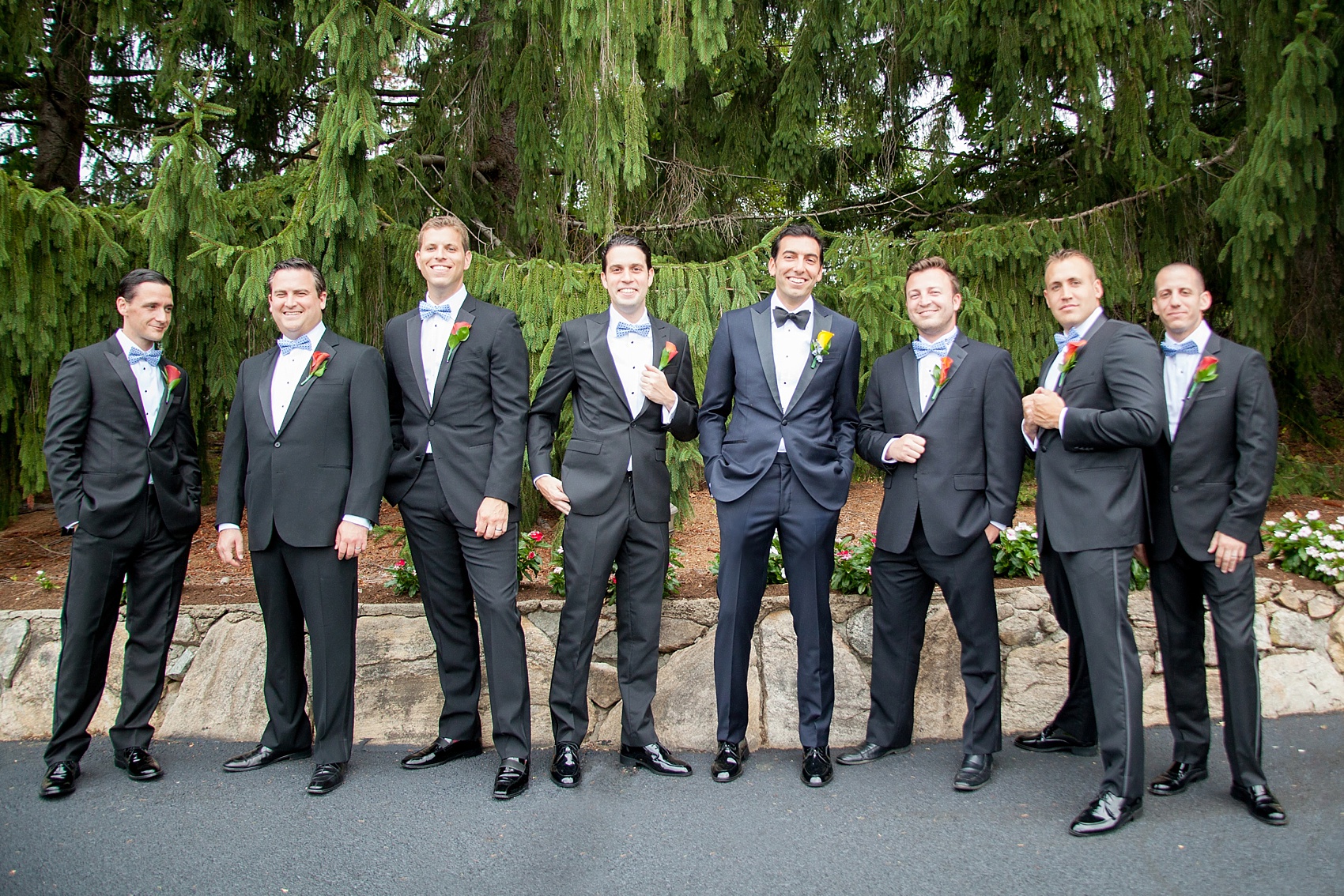 Perona Farms wedding photos groomsmen in navy and black tuxedos for a colorful summer celebration. Pictures by New Jersey photographer Mikkel Paige Photography.