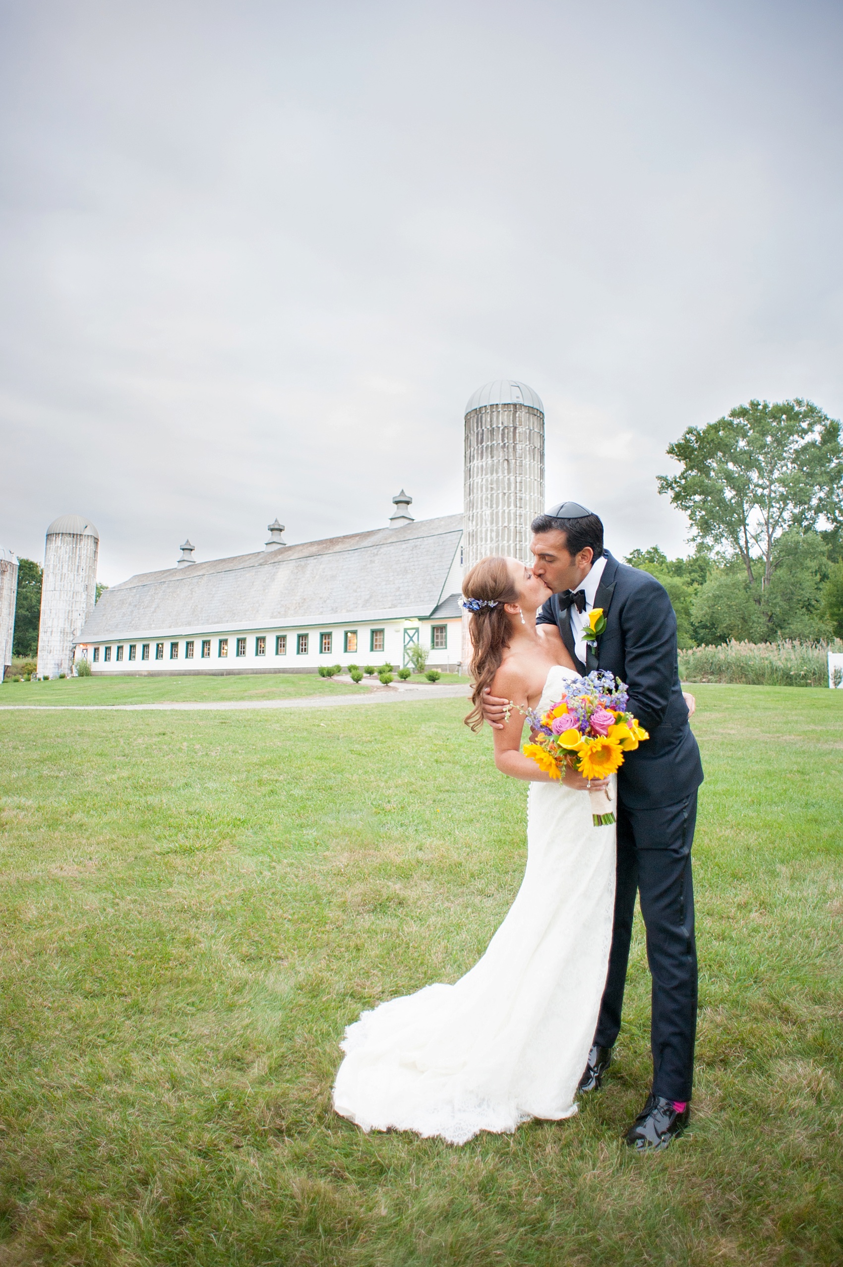 Perona Farms wedding photos barn bride groom photos for a colorful rustic summer celebration. Pictures by New Jersey photographer Mikkel Paige Photography.