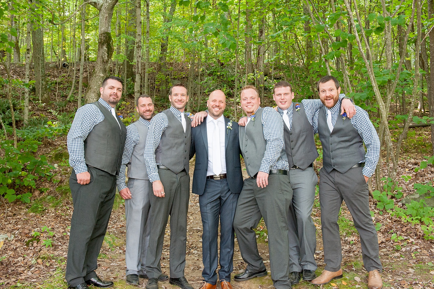 Grey vests and blue plaid shirts for a Berkshires camp wedding. Photos by Massachusetts wedding photographer, Mikkel Paige Photography.