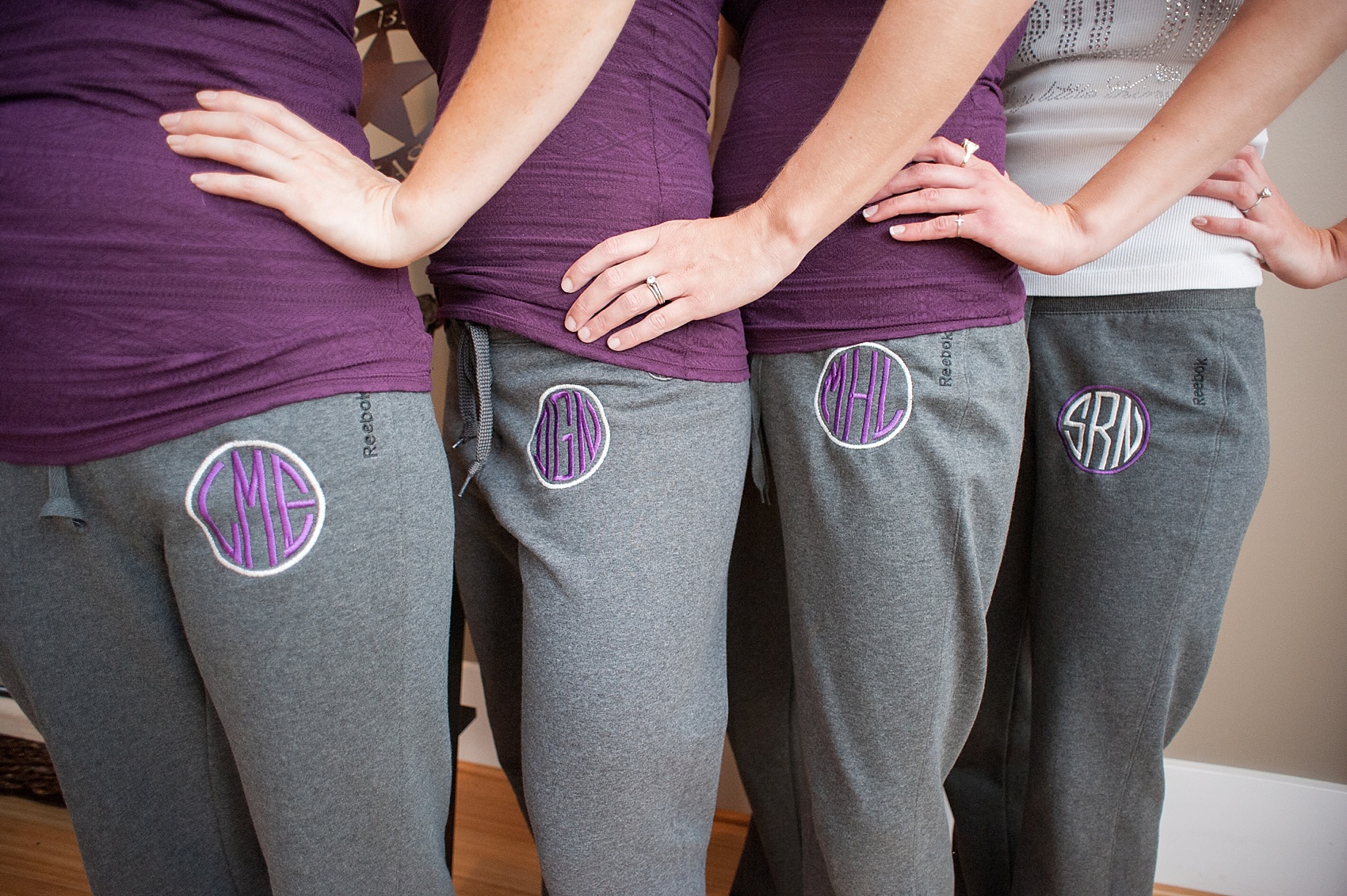 Monogrammed bridal party sweatpants for downtown Cincinnati, Ohio wedding at The Center. Photos by Mikkel Paige Photography.