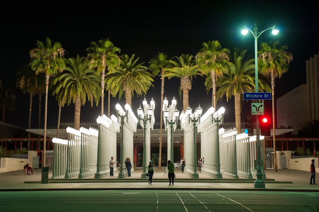 Engagement photos at the LA lamp posts, Los Angeles County of Art. Photos by LA wedding photographer, Mikkel Paige Photography.