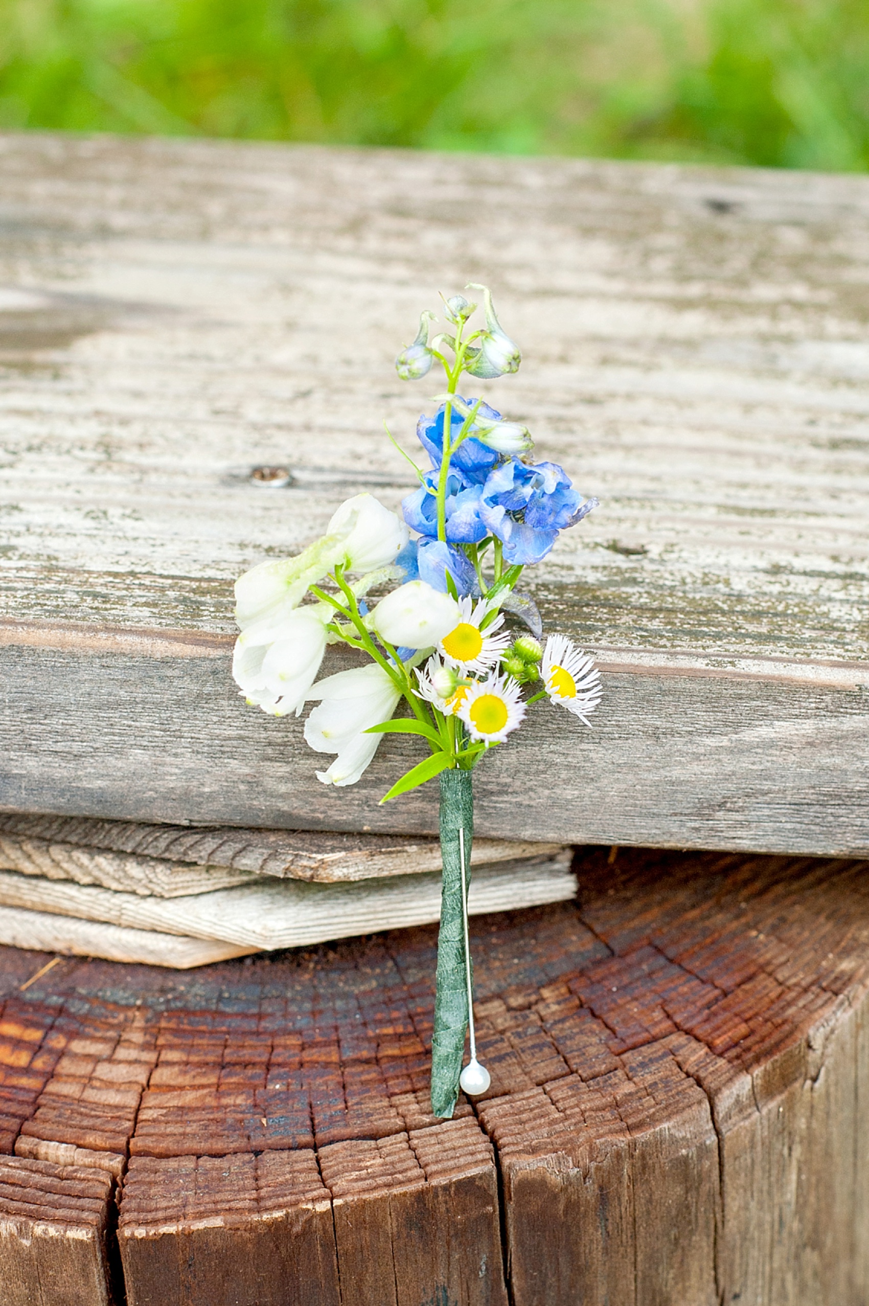 Wildflower boutonniere for a Berkshires wedding at Camp Wa Wa Segowea. Photos by Mikkel Paige Photography, destination wedding photographer.