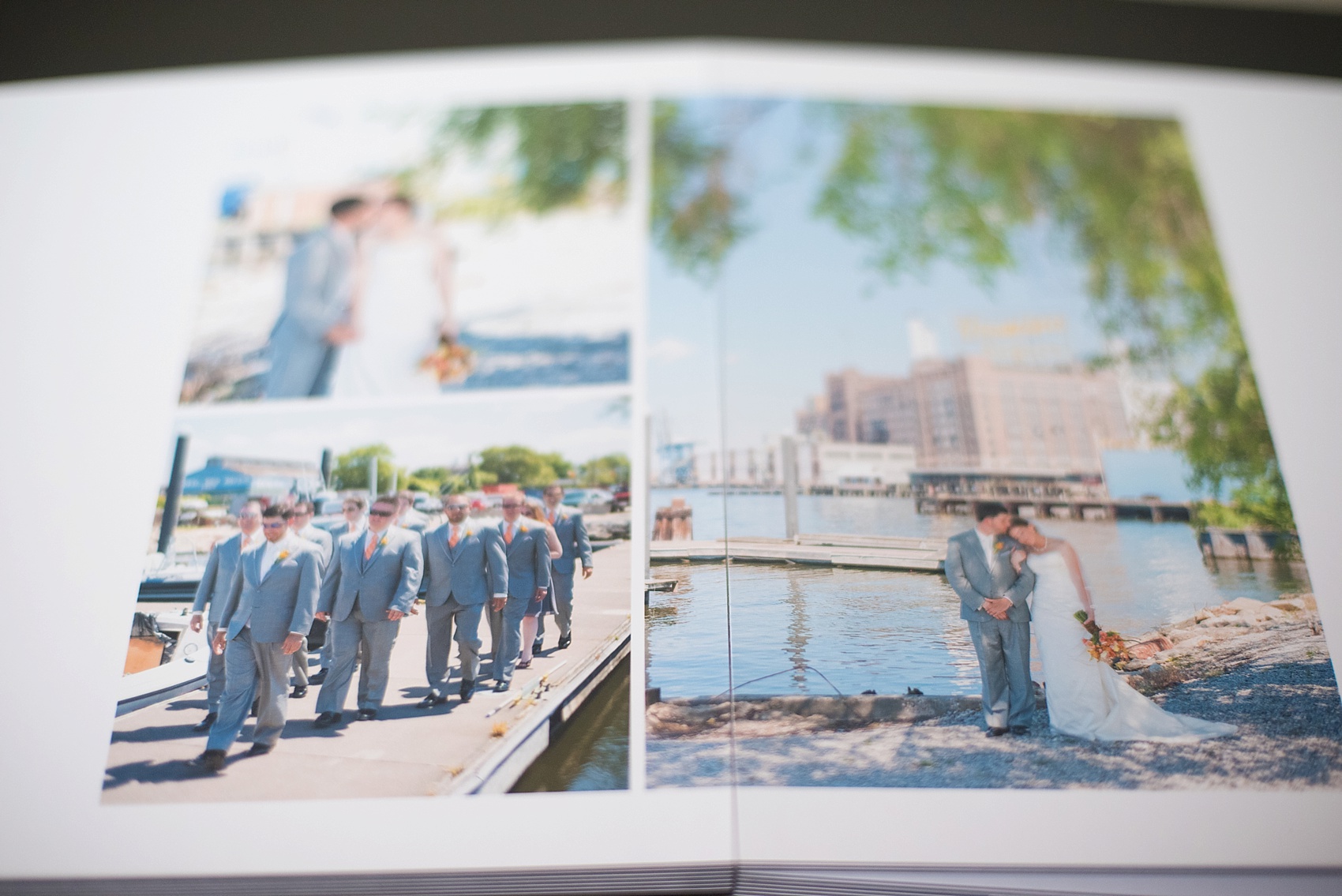 Grey leather wedding album showing seamless gutter between a spread, by Mikkel Paige Photography. 