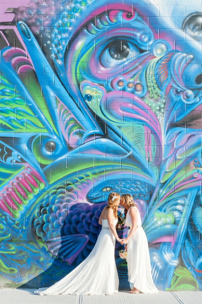 Wedding gowns by Jenny Yoo and Henry Roth, and flowers by Foxglove for a gay, lesbian wedding at 501 Union, Brooklyn, NY. Photography by Mikkel Paige, NYC wedding photographer.