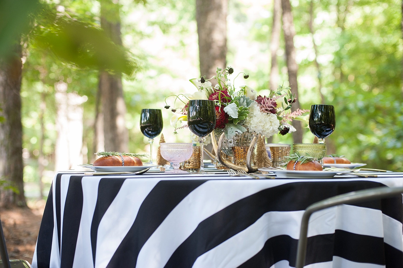 Raleigh, NC wedding inspiration by Mikkel Paige Photography. Modern take on a rustic table at Umstead Park. 