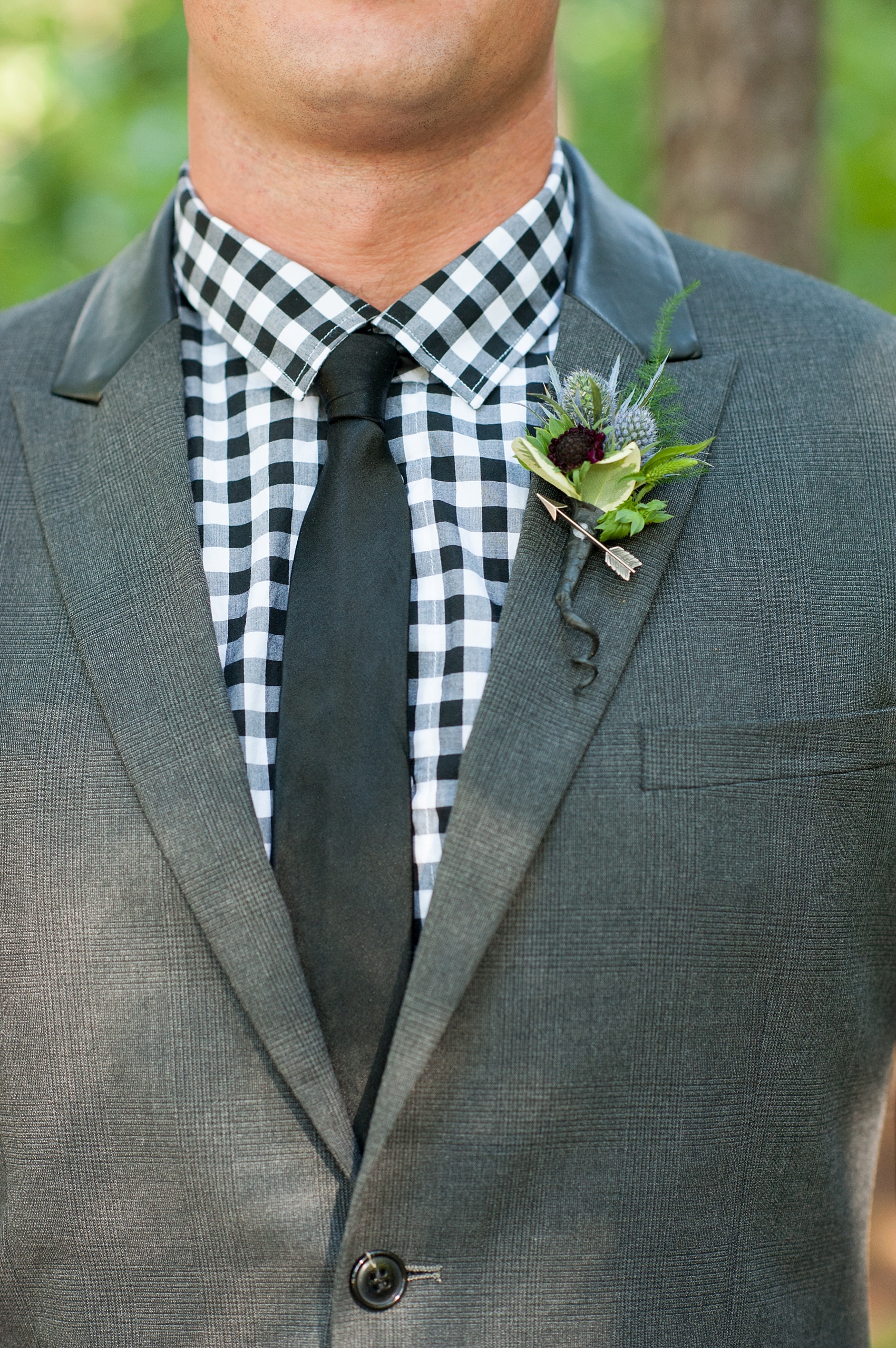 Raleigh, NC wedding inspiration by Mikkel Paige Photography. Rustic modern boutonniere and plaid shirt on the groom at Umstead Park. 