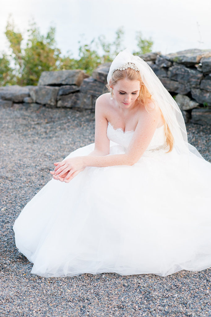 Mikkel Paige Photography pictures from a wedding in Bergen, Norway. An image of the bride in a tulle skirt and veil.