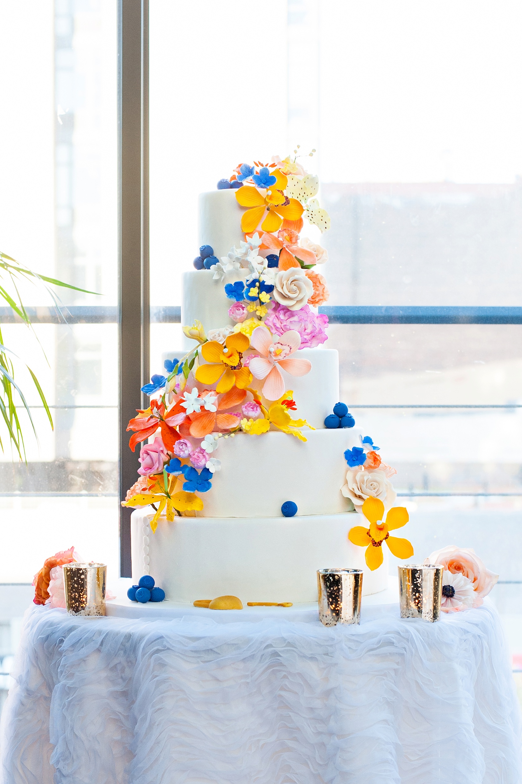 Spring cake with gumpaste cascading flowers for a Lock and Key, Forever Linked, Ponts des Art wedding inspiration. Photos by Mikkel Paige Photography, planning by Dulce Dream Events. Cake by Made in Heaven Cakes.