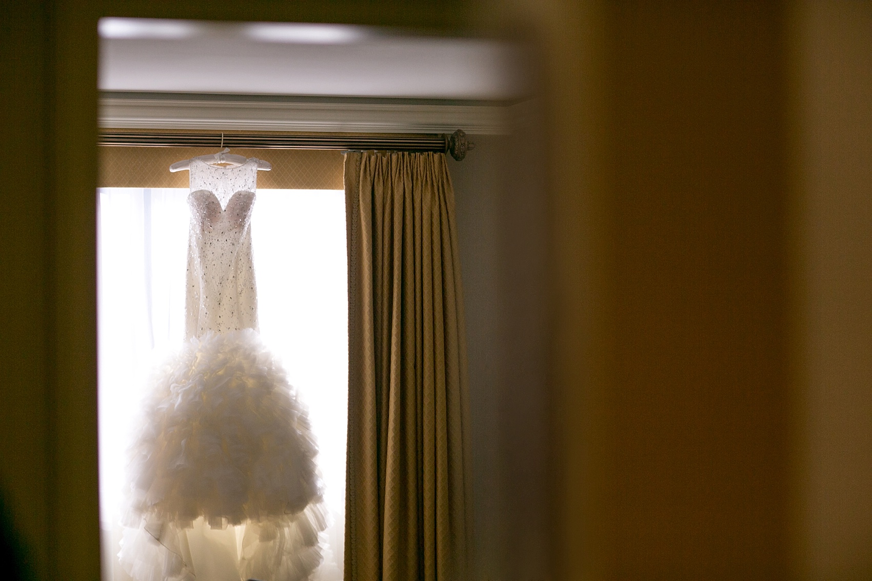 Washington, DC wedding photos by Mikkel Paige. White wedding gown for a Presidents Weekend wedding at The Ritz Carlton, Pentagon City.