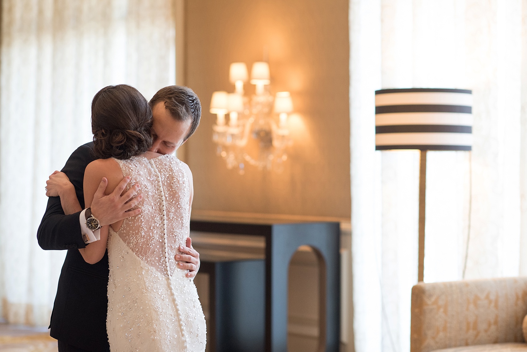 Washington, DC wedding photos by Mikkel Paige. The bride and groom's first look at The Ritz Carlton, Pentagon City.