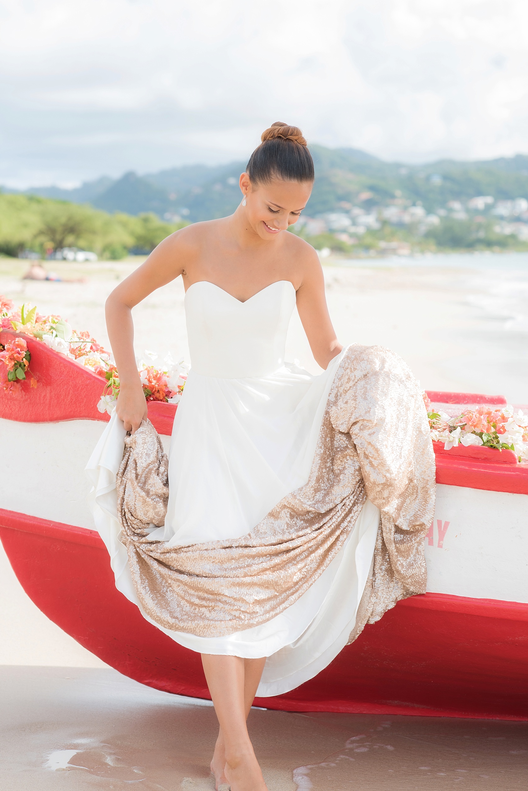 St. Lucia destination wedding beach elopement by Mikkel Paige Photography, at The Landings. Tropical bouquet with orchids and ginger snaps. Gown by Truvelle.