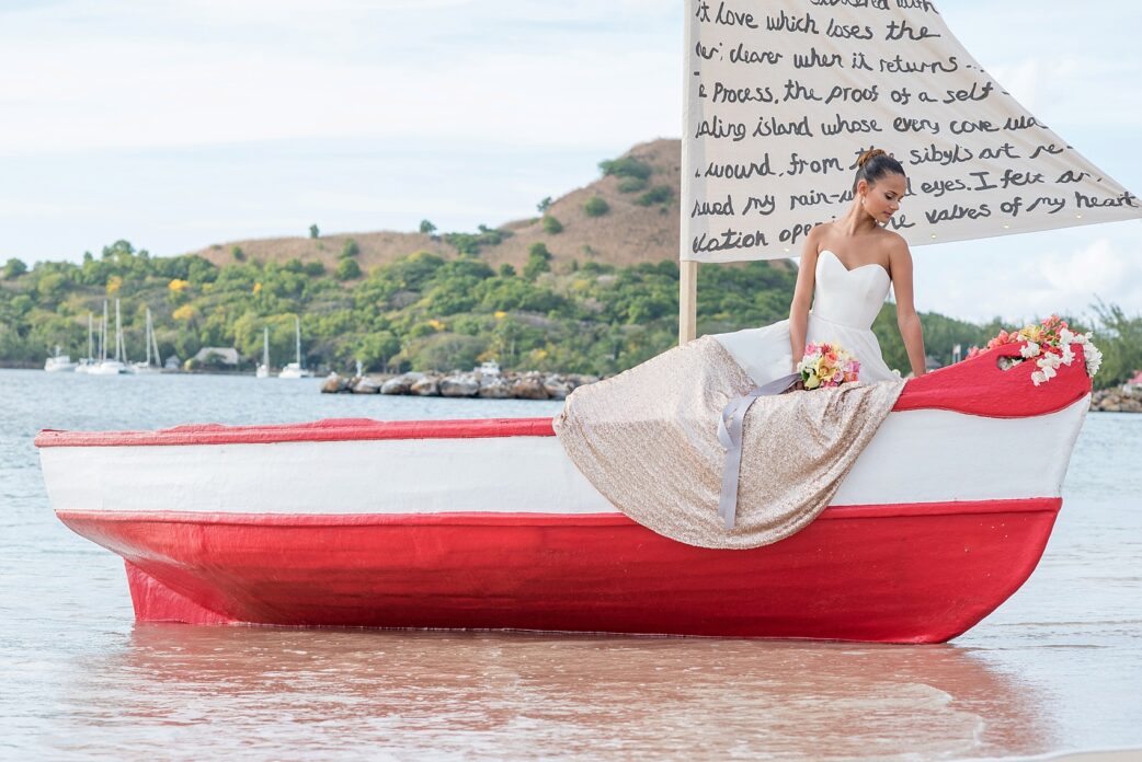 St. Lucia destination wedding beach elopement by Mikkel Paige Photography, at The Landings. Tropical bouquet with orchids and ginger snaps. Gown by Truvelle.