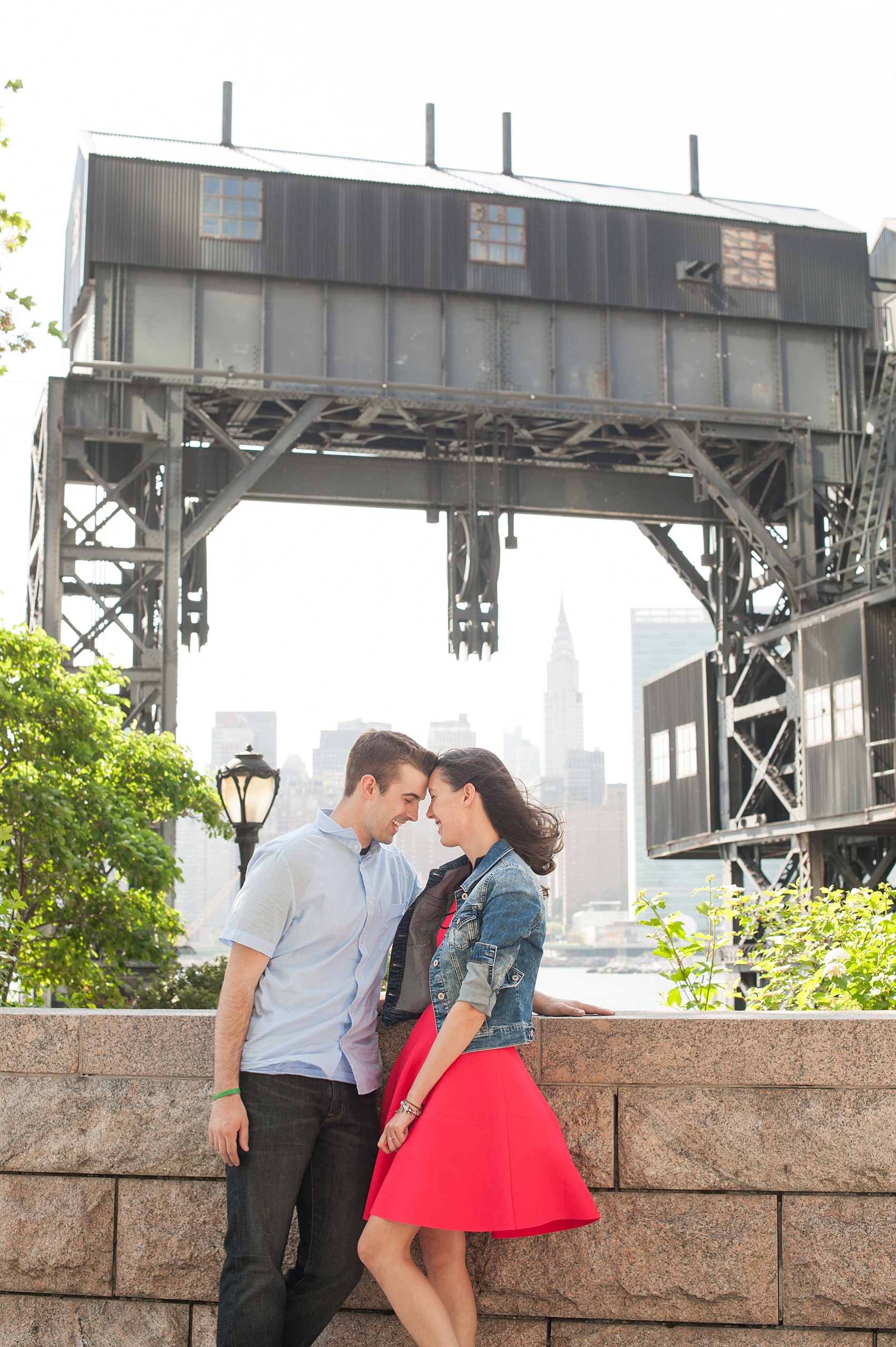 Long Island City waterfront engagement session at Gantry State Park by Mikkel Paige Photography. Complete with the Empire State Building in the background!