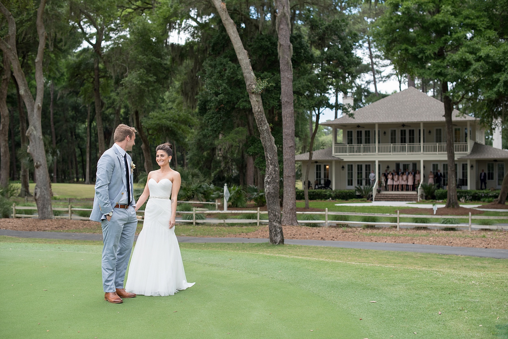 First look for the bride and groom on a golf course in Haig Point, South Carolina, off the coast of Hilton Head. Photos by Mikkel Paige Photography.