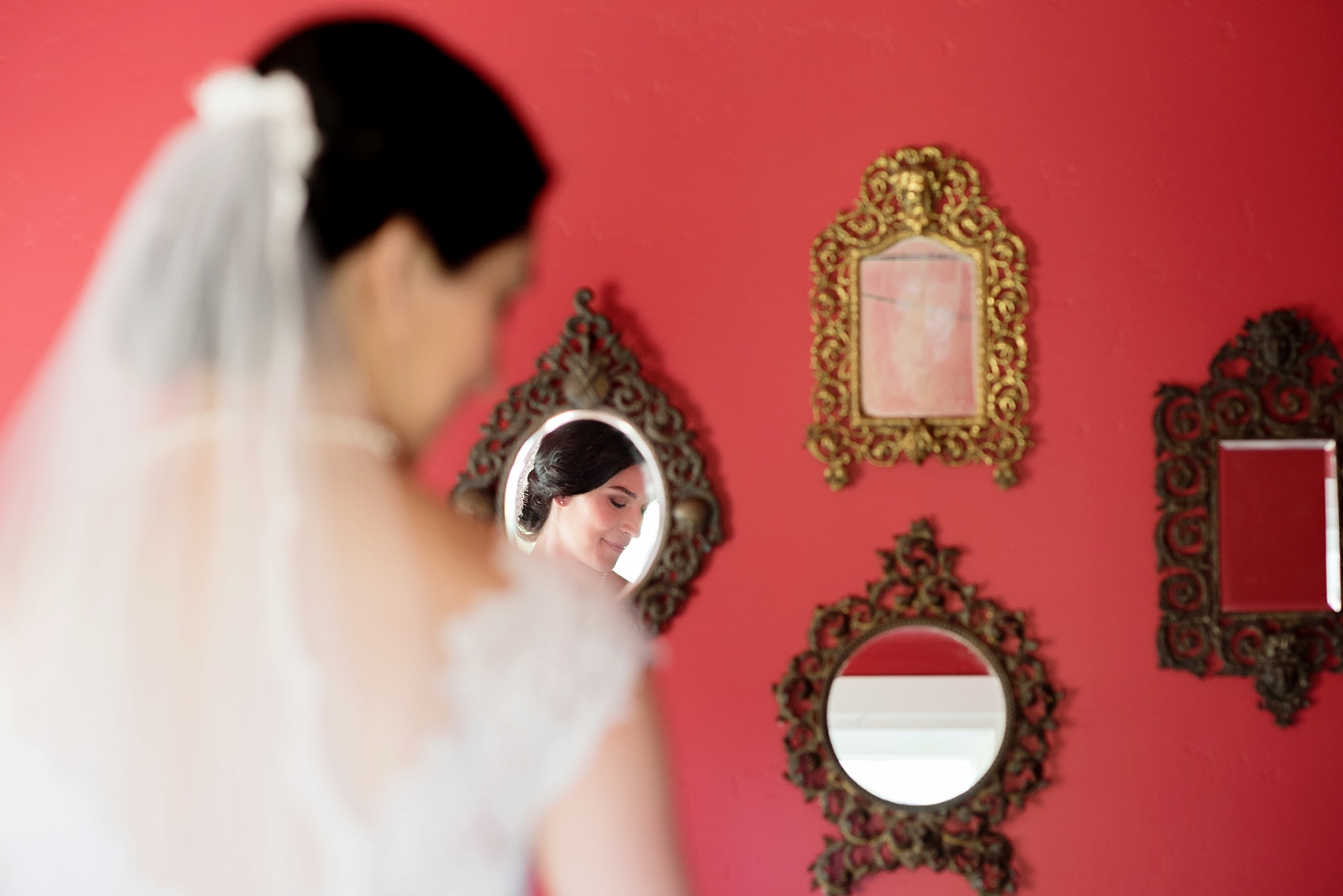 Bride prepares for her Vineyard elopement with Mikkel Paige, destination wedding photographer. Held at HammerSky Vineyard, south of San Francisco. Wedding gown designed by Ramona Keveza.