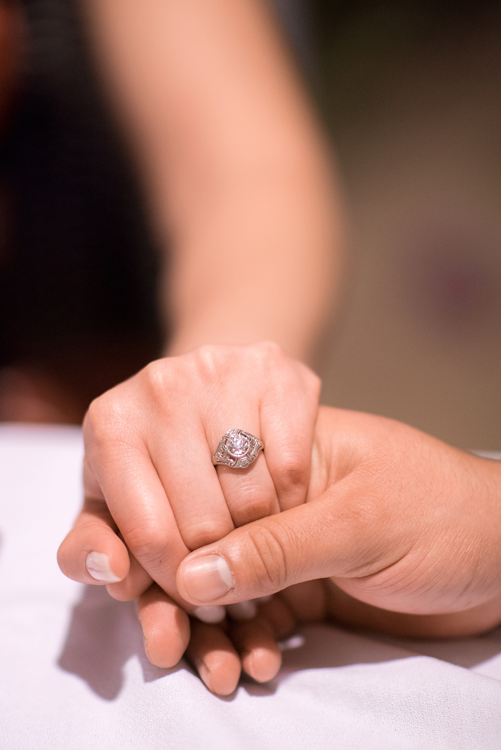 Vintage antique white gold diamond engagement ring. St. Lucia Proposal ideas - beachside romance at an oceanfront dinner at The Landings resort.  Photos by destination wedding photographer Mikkel Paige Photography.