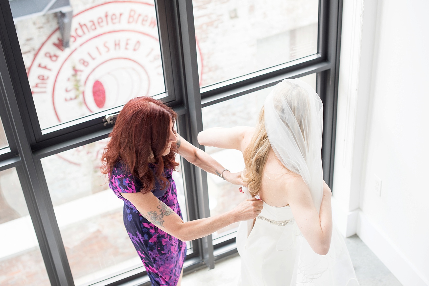 Bridal portraits and getting ready at the Wythe Hotel in Williamsburg, Brooklyn. Images by Mikkel Paige Photography.