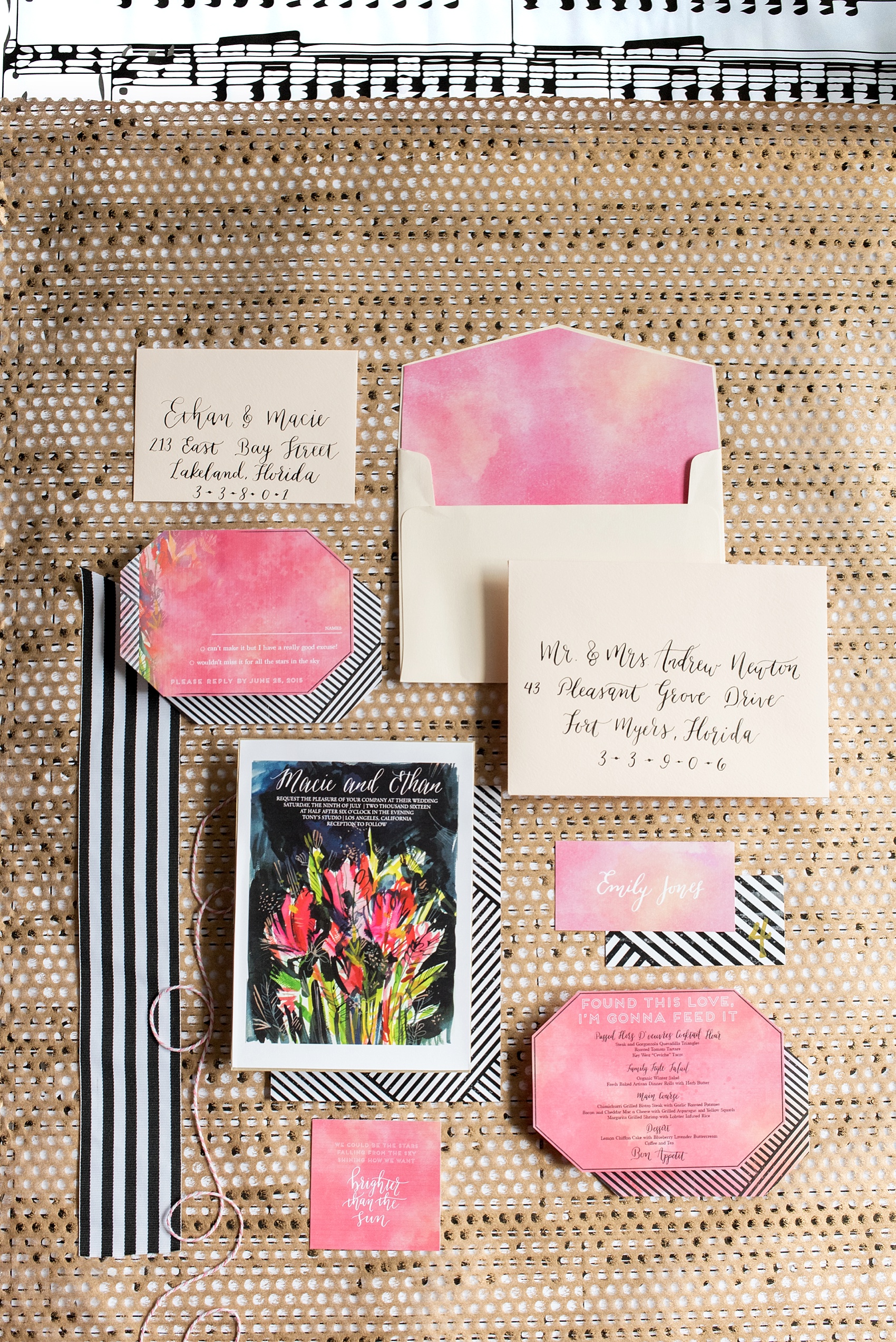 Pink and orange invitation suite with custom calligraphy. Photos by Mikkel Paige, calligraphy by Estudio Rojo.