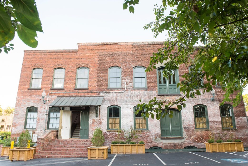 Melrose Knitting Mill rustic charm venue in downtown Raleigh. Photos by Mikkel Paige Photography, Raleigh wedding photographer.