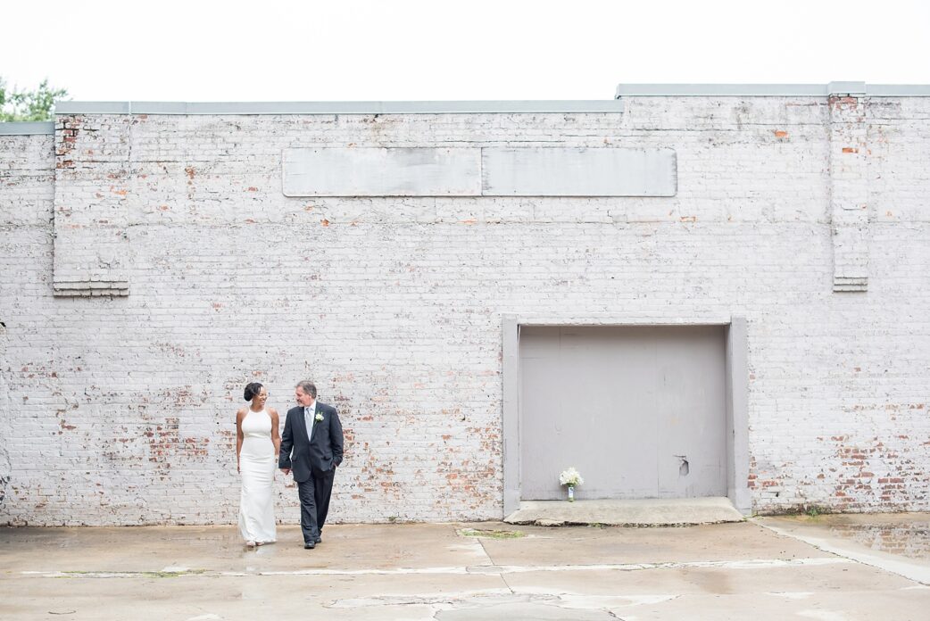 Downtown Raleigh, NC mixed race wedding. Photos by Mikkel Paige Photography. Photos of the bride and groom.