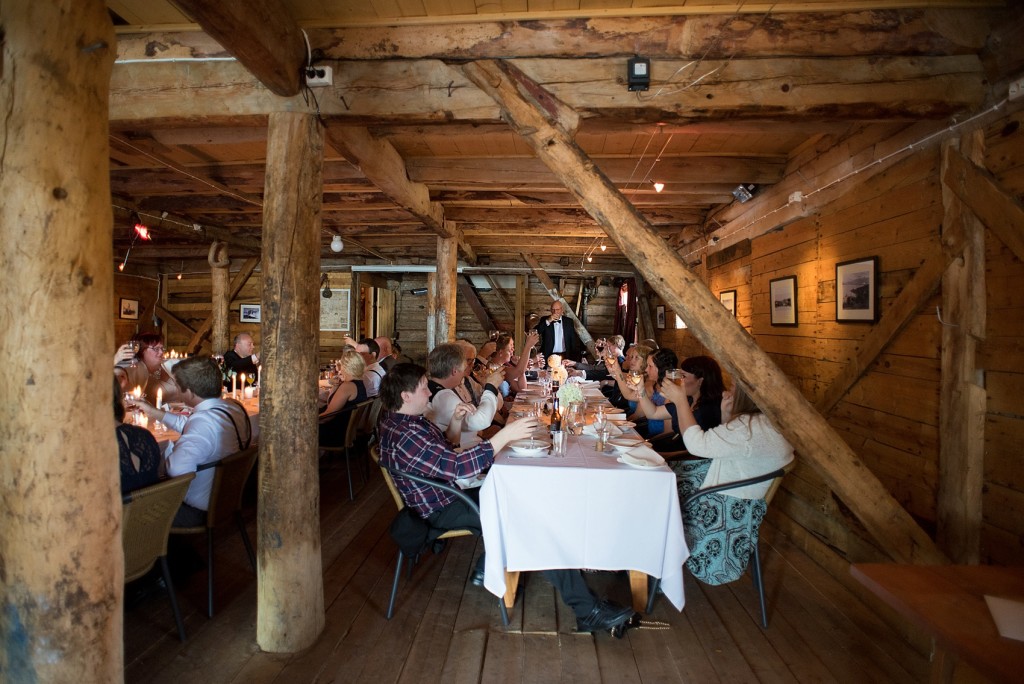 Norway wedding photos by Mikkel Paige Photography, destination wedding photographer. Waterfront dinner in the north of Norway.