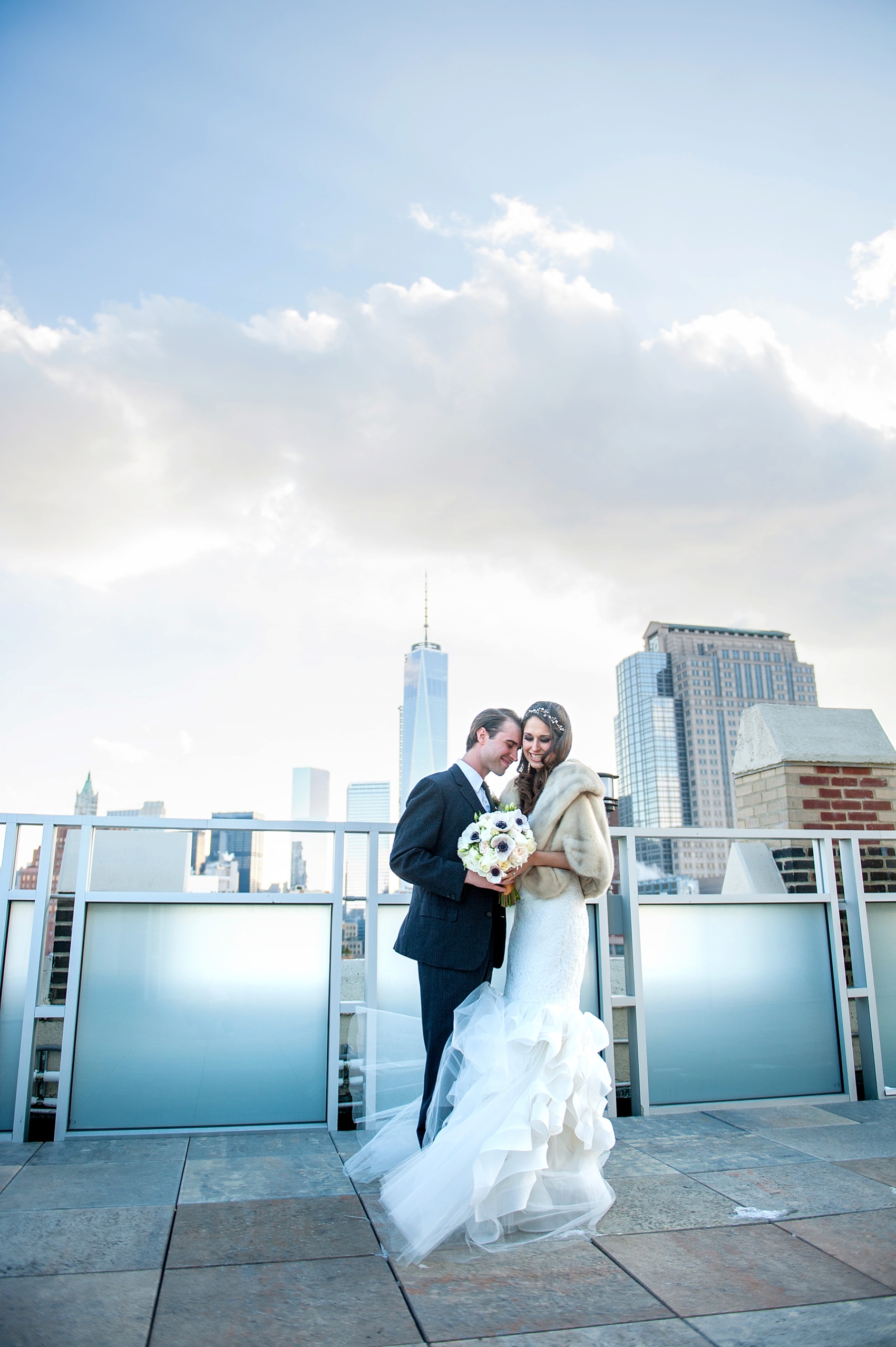 Freedom Tower view from Tribeca Rooftop. Bride and groom wedding photo in February. Never forget. Image by Mikkel Paige Photography, NYC wedding photographer.