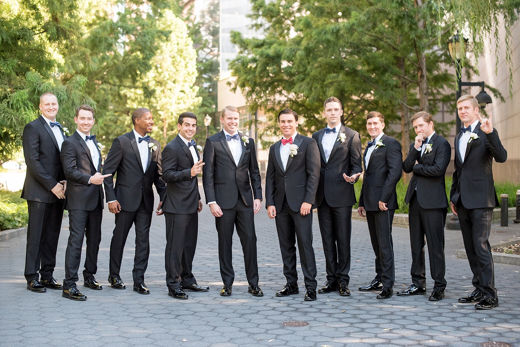 Groomsmen photos in Battery Park. Photo by NYC wedding photographer, Mikkel Paige Photography.