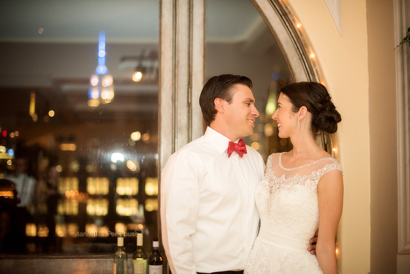 Manhattan Penthouse wedding with the NYC skyline. Image NYC wedding photographer, Mikkel Paige Photography. 